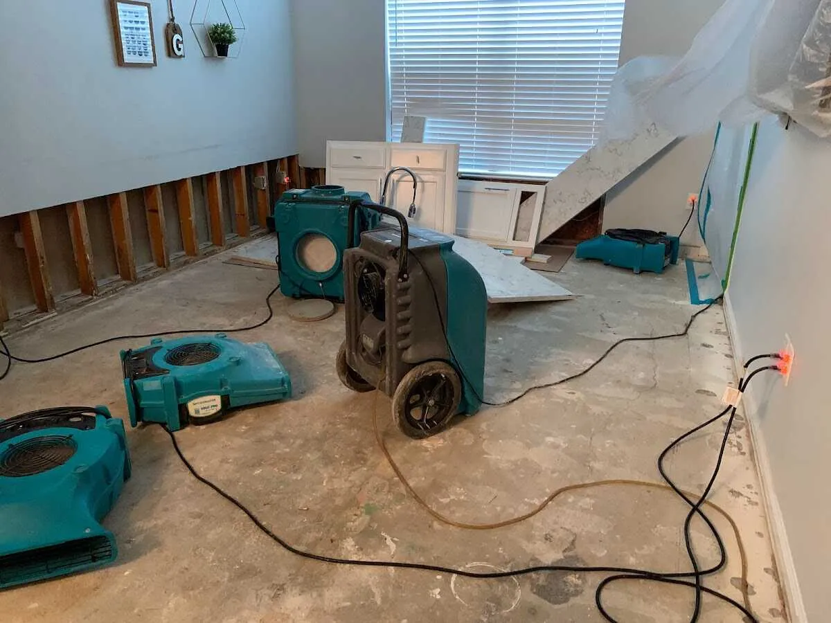 Dehumidifier in flood-cut room for Water Damage Restoration in Geneseo